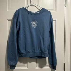 Blue crewneck, sun and moon size medium